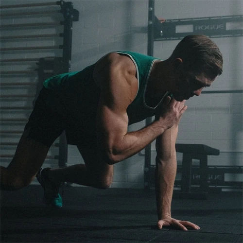man doing a one handed push up
