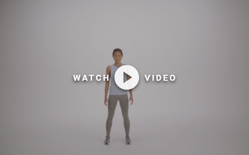 woman standing to do a squat jump