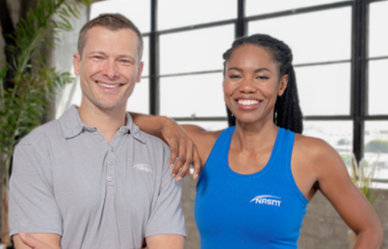 Two NASM Trainers Smiling