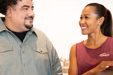 Female trainer with male client