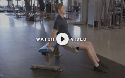 man using weight bench