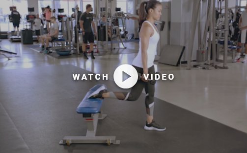 woman with foot on a bench doing a bulgarian split squat