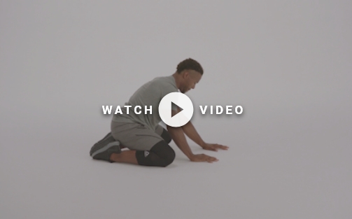man demonstrating childs pose exercise