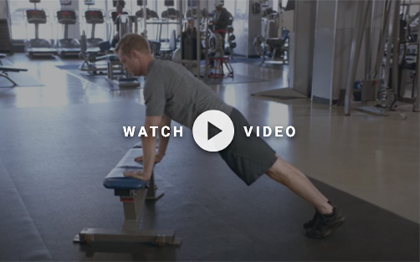 man performing an incline push up