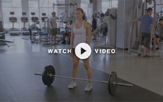 man using a barbell