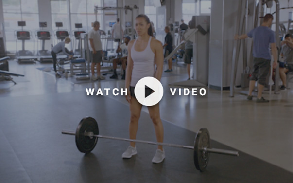 man using a barbell