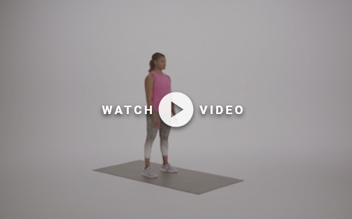 woman demonstrating tuck jump exercise