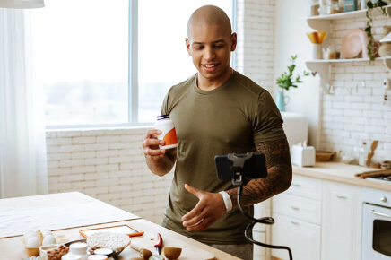 A man using his phone to video nutrition facts