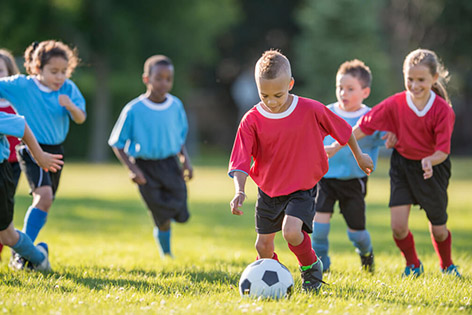 youth athletes playing sports
