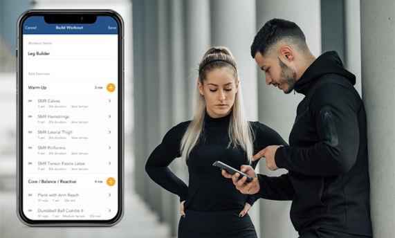 personal trainer and client updating app workout