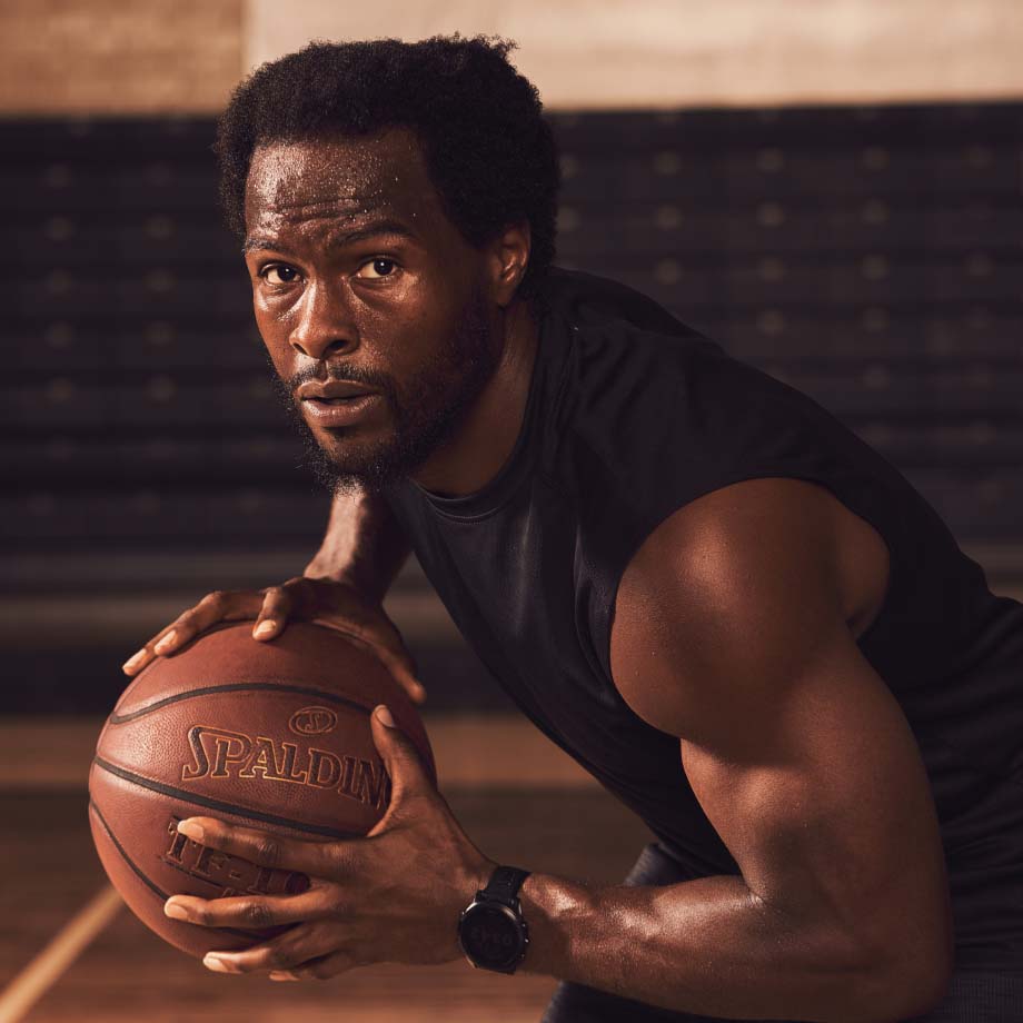 A man holding a basketball