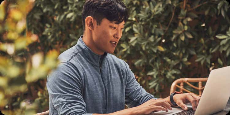 Person looking at laptop