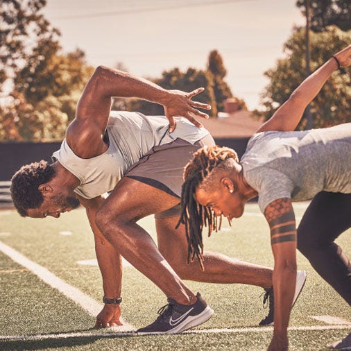 a man and women getting ready to run