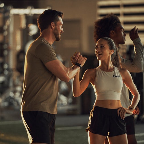 a man and a woman congratulating each other