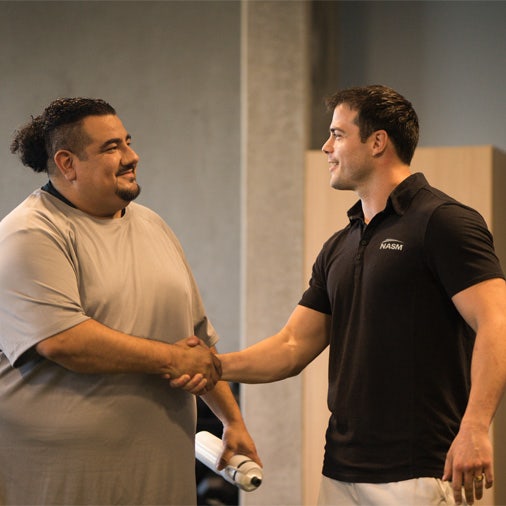 Woman and man making food in the kitchen