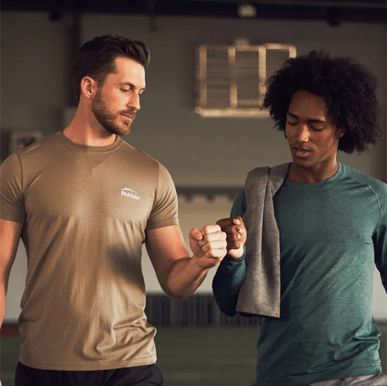 two athletes talking to each other